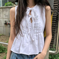 Honora ラッフルヘムタイフロントトップス
